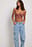 Bustier i satin med v-form og blonde